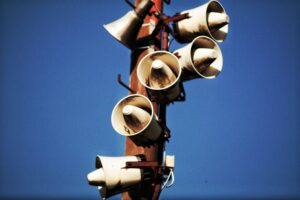 megaphones mounted on a pole